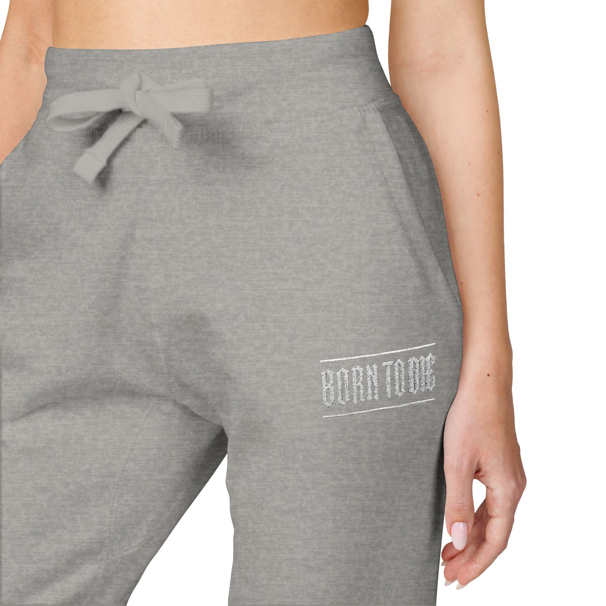 Pantaloni da jogging con logo floreale bianco a script | Pantaloni della tuta ricamati